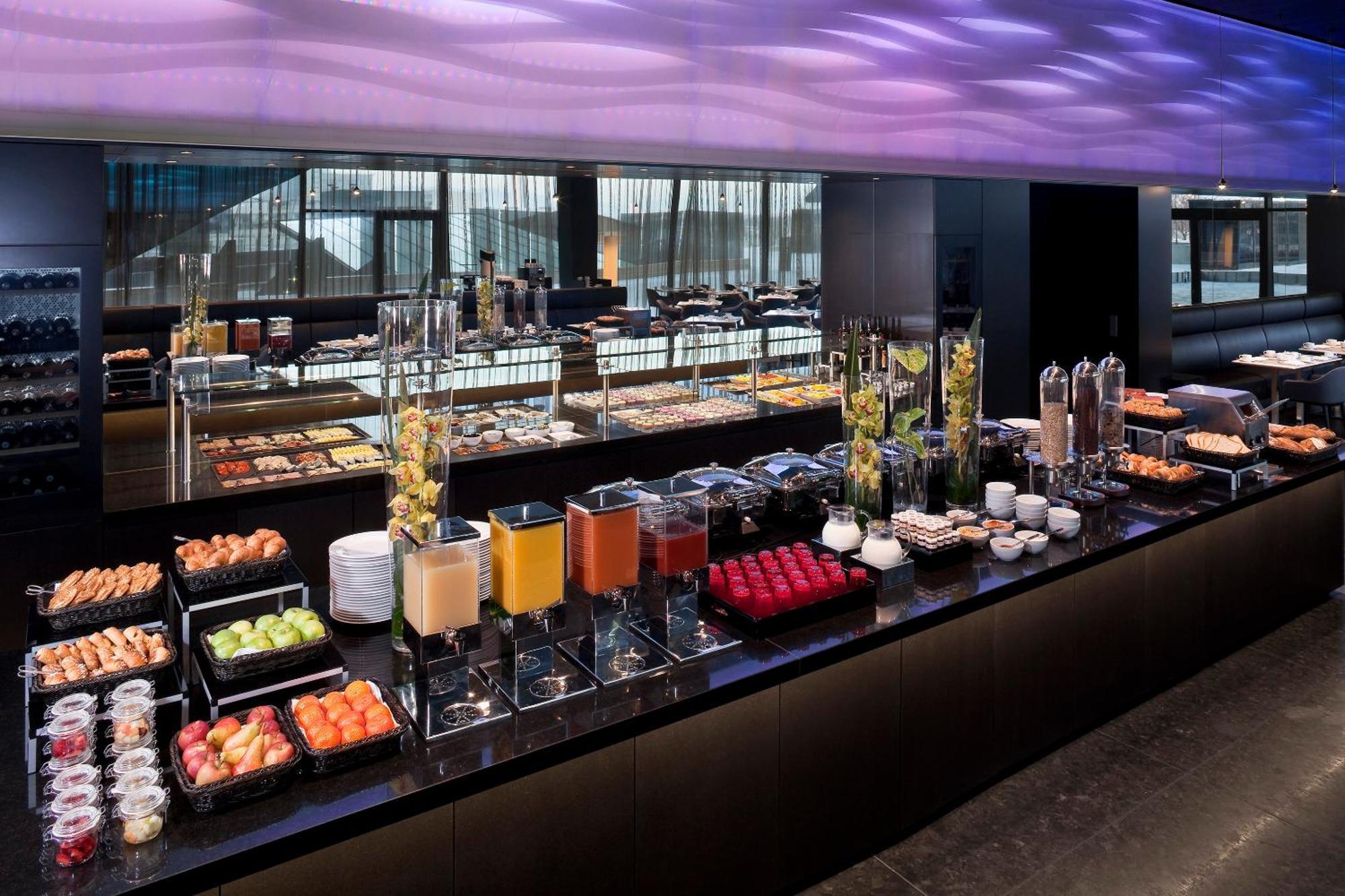 Melia Vienna Hotel Exterior photo The buffet at the lounge